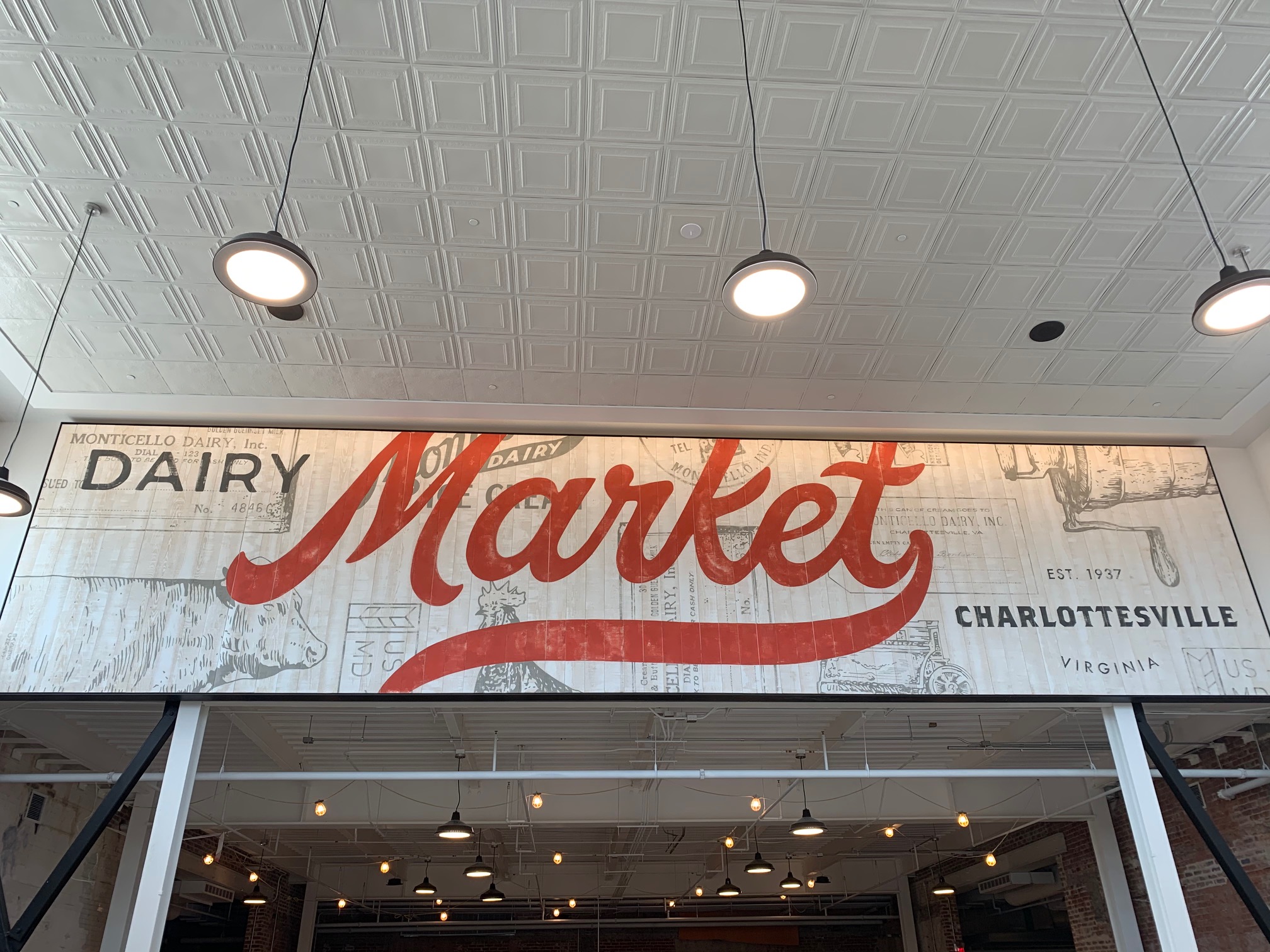 Entrance Sign to Dairy Market - says "Dairy Market"